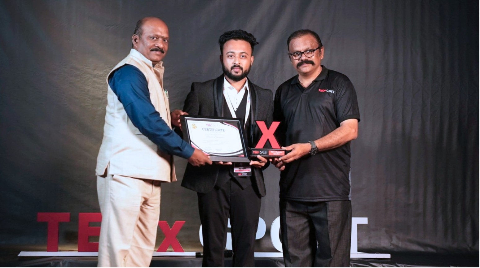 Bipin Bopanna receiving a TEDx award